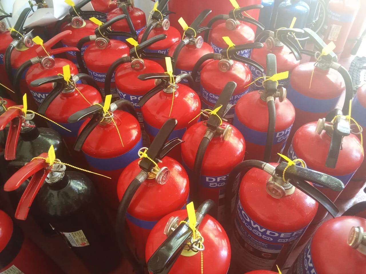 High-security tamper-evident security pull-pins and inspection tags on extinguisher valves
