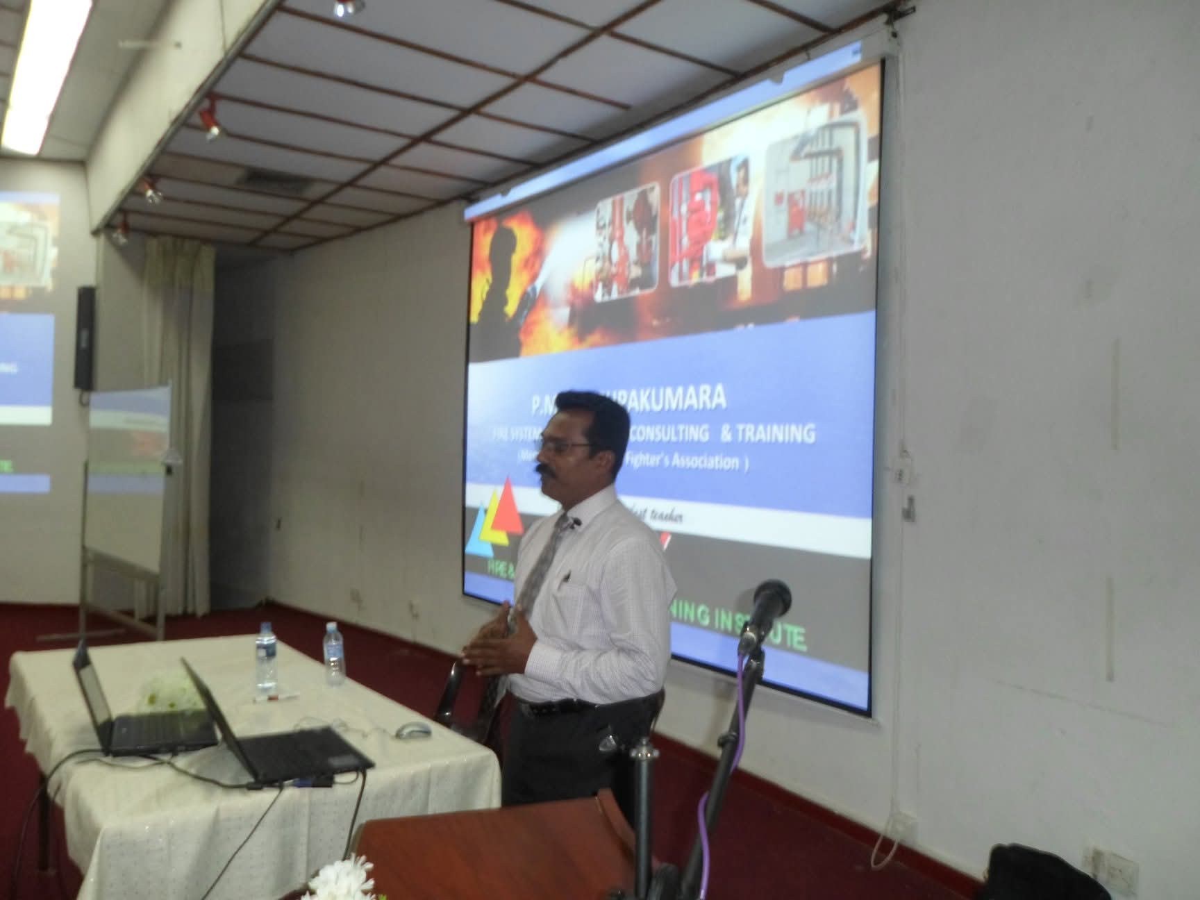 Interactive fire theory presentation in training classroom with digital projector